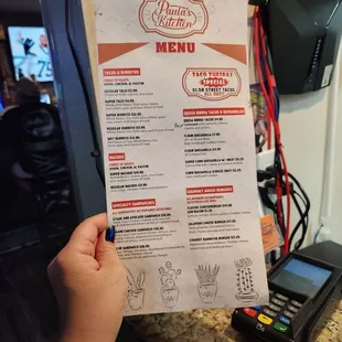 Food menu. You order yourself at the little window as they are independent from the bar.