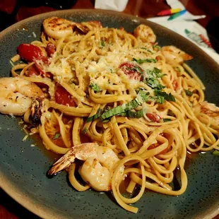a plate of pasta and shrimp