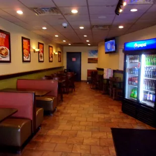 Standard pizzeria indoor eating area