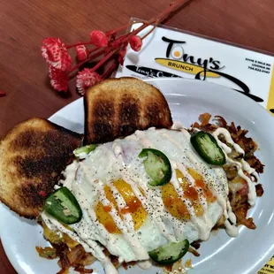 Marvelous Crispy Hashbrowns topped with Chorizo, Veggies, Egg's and Jalapenos.Wowed Delicious