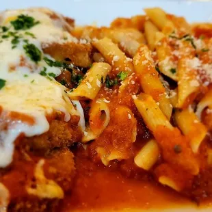 a plate of pasta and meatballs