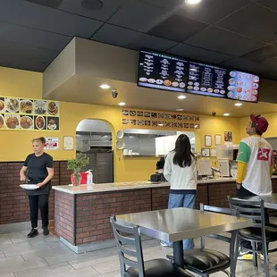 Inside the restaurant with one of the beautiful, helpful ladies.
