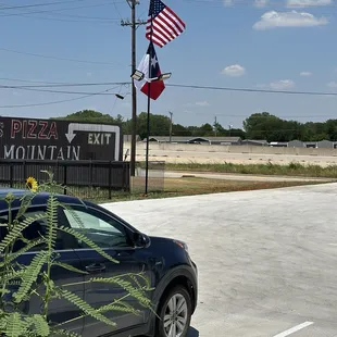 Outdoor sign and flags