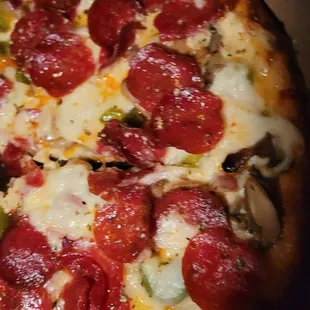 a pepperoni and cheese pizza