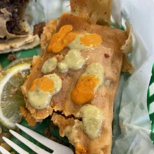 Tamales with the colorful orange and green Salsa