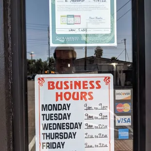 a business hours sign