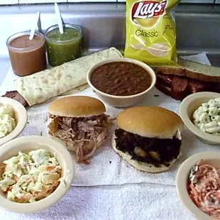 Sandwiches Burritos and sides with BBQ sauce and Chile