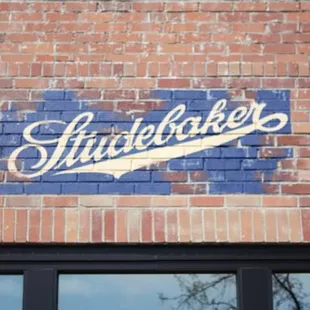 Aged lettering on wall