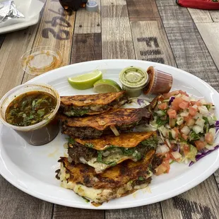 Birria tacos with dipping sauce