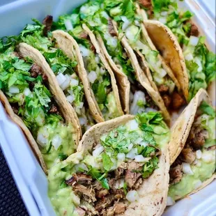 8 tacos: 4 carne asada, 2 chicken, 2 adobada.