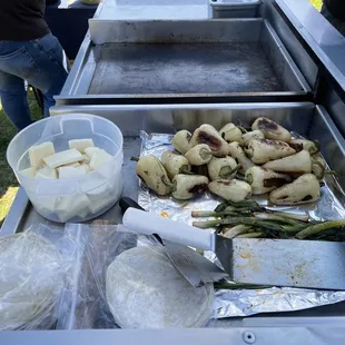 a tray of food being prepared