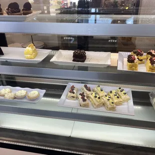 a display of cakes and pastries