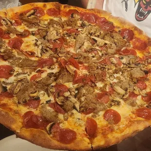 XL New York style pizza with the works (minus peppers)