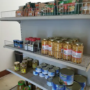 a shelf of canned food
