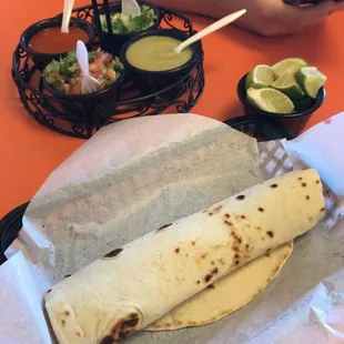 a burrito and a side of salsa