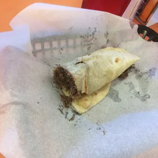 a burrito in a basket