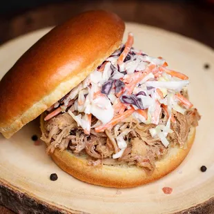 a pulled pork sandwich with coleslaw