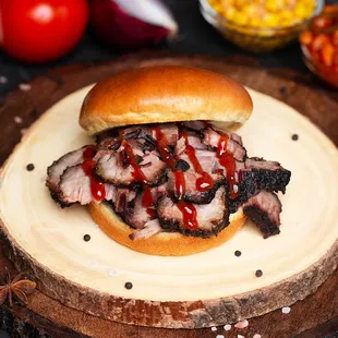 a pork sandwich on a bun