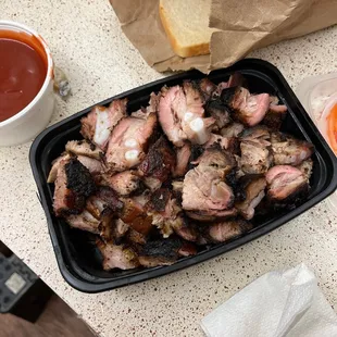 a tray of barbecued meat