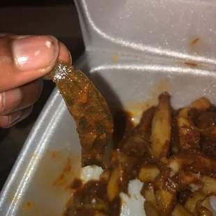 Found this leaf in my chili cheese fries .