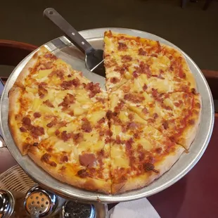 Bacon and pineapple.  New York Style.  Is delicious as well though I prefer Chicago style.