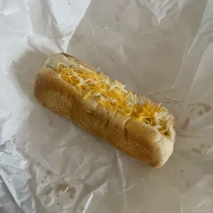 Coney with onion, sauce , cheese