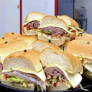 Party tray of American Subs made with the works