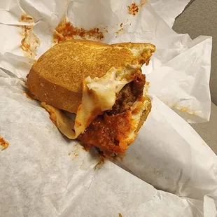 a half eaten sandwich