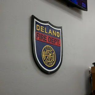 Delano Fire Department sign by the restaurant ordering area
