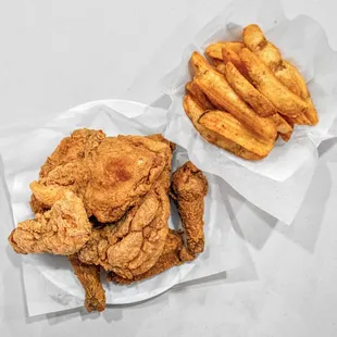 two baskets of fried chicken
