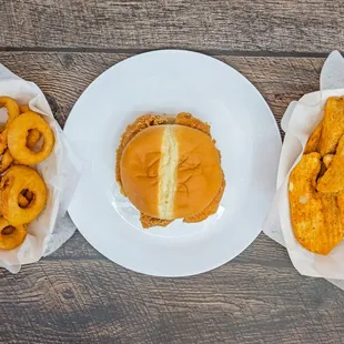 a hamburger and onion rings