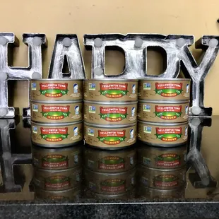 a display of happy canned food