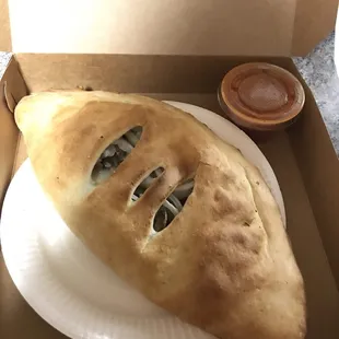 Basic calzone.  Paid an additional $1.25 for each ingredient: mushrooms, sausage, and onions.