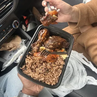 Jamaican jerk chicken with rice, beans and veggies.