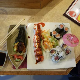 Eel handroll, spicy crunchy tuna roll, salmon roll and salmon and eel roll.