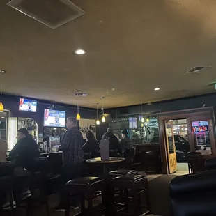 people sitting at the bar