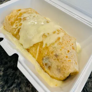 to go - Carnitas Burrito (sauce on side)