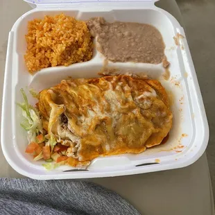 a meal in a styrofoam container
