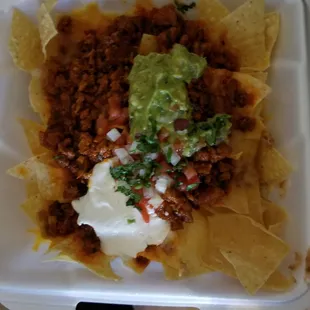 Super nachos with pastor