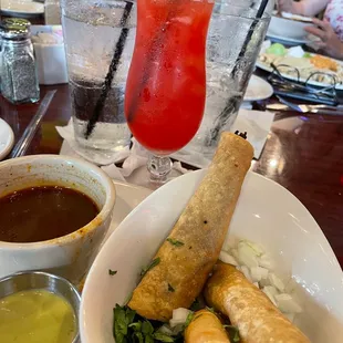 Flautas de Birria and large strawberry margarita