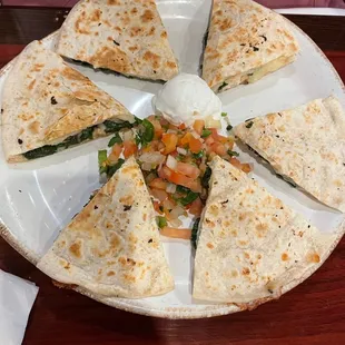 Chicken and Spinach Quesadilla - kind of bland, but they had this creamy, spicy green sauce I dipped it in which is very good!