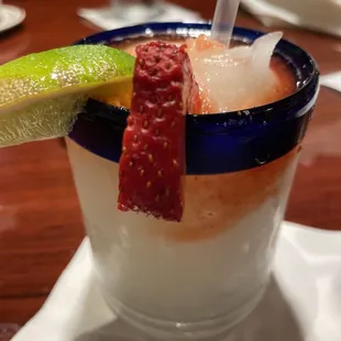 Frozen margarita with splash of strawberry