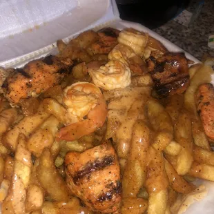 Cajun fries with chicken kabob &amp; shrimp