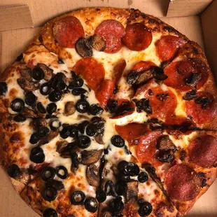 a pepperoni and olive pizza