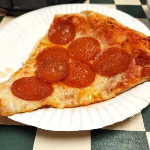a slice of pepperoni pizza
