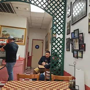 two men sitting at a table