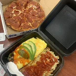 Veggie Omlette with hash browns and a small pep pizza. Of course I threw hot sauce and chup all over it. Delicious!!!