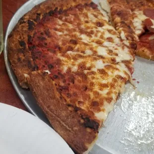 Overly done pizza cheese and crust.