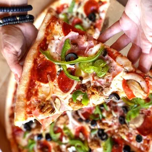 Grabbing a huge slice!