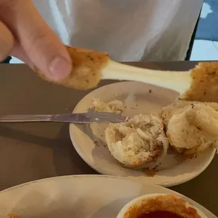 a person eating a piece of bread